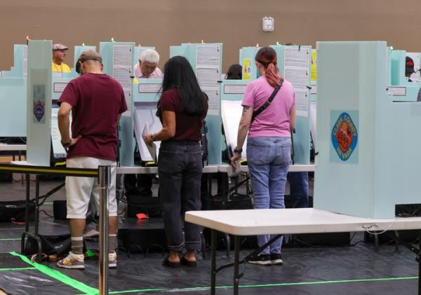 People vote on the first day of in-person early voting at Desert Breeze Community Center on Oct. 19 in Las Vegas, Nevada.