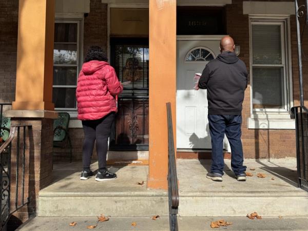 Vero<em></em>nica Bell and Brian Phelps knock doors in the Hunting Park neighborhood of Philadelphia.