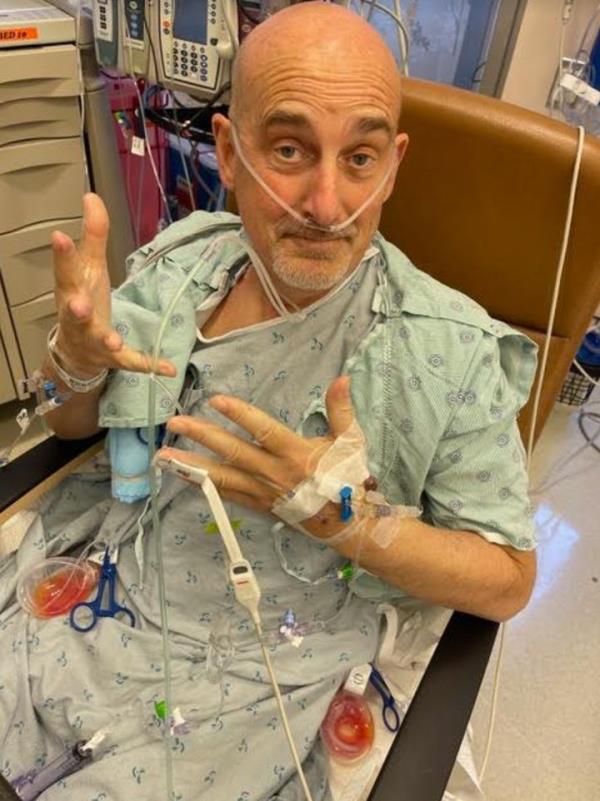 Jeff in the ICU after his Whipple surgery. “They removed his pancreas, spleen, 1/3 of his small intestine, reco<em></em>nstructed his portal vein, and, still, there he was, with his sweet ’nothin’ to see here’ face.”