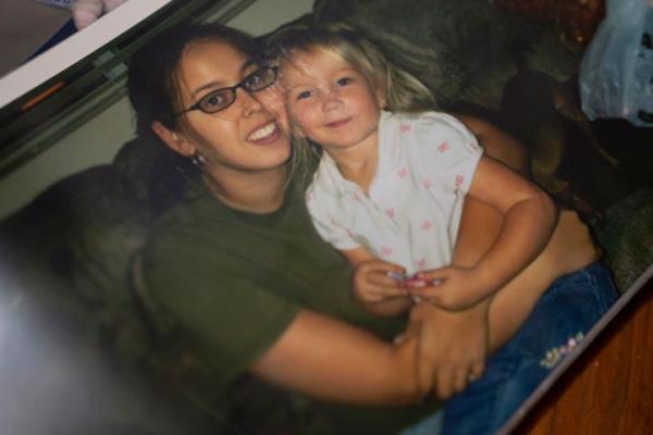 At her home in Vidor, Texas on October 24, 2024, a photograph of Candace Fails with her late daughter Nevaeh Crain, who passed away on October 29, 2023 at 25 weeks of pregnancy due to preventable causes, including hemorrhaging, after seeking medical help at various hospitals. (Danielle Villasana for ProPublica)