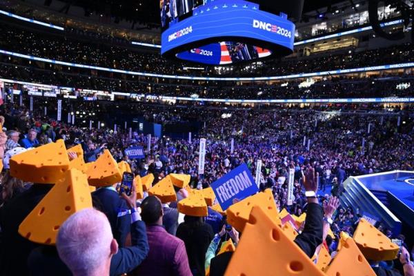 Wisco<em></em>nsin delegates wearing cheese hats take part in the ceremo<em></em>nial roll call vote on the second day of the Democratic Natio<em></em>nal Co<em></em>nvention (DNC) in August. Wisco<em></em>nsin is one of seven swing states. 