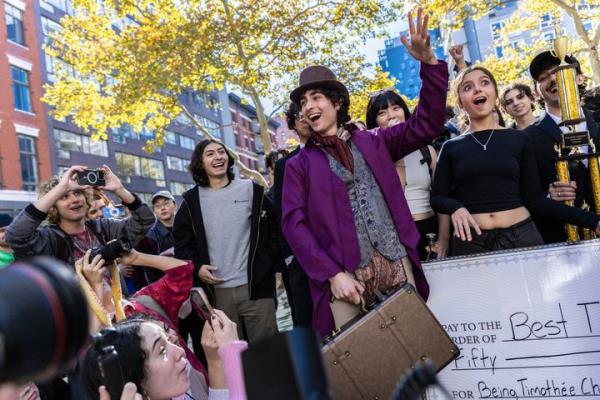 Miles Mitchell, 21, winner of the Timothee Chalamet lookalike co<em></em>ntest near Washington Square Park, Sunday, Oct. 27, 2024, in New York. (AP Photo/Stefan Jeremiah)