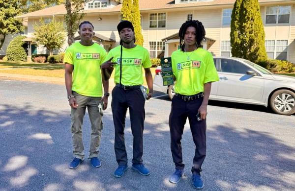 Mudrik McWilliams (left) canvassing in Atlanta with his brothers. “There are tangible differences that we can make in our community with our vote,