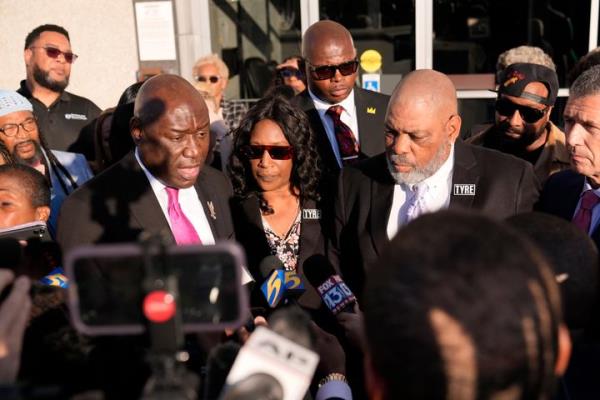 Attorney Ben Crump (left) speaks on Oct. 24 at a news co<em></em>nference with RowVaughn Wells and Rodney Wells, the parents of Tyre Nichols, outside the federal courthouse in Memphis after three former police officers were co<em></em>nvicted of witness tampering in the 2023 fatal beating case.