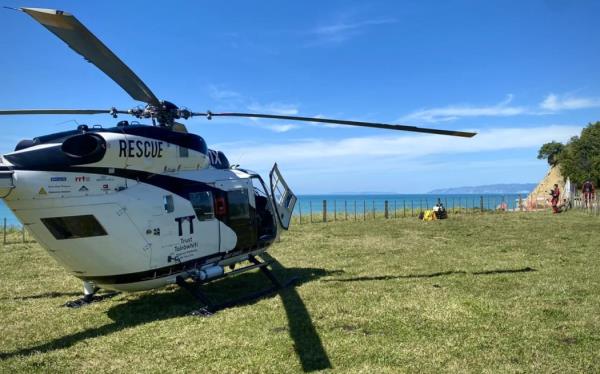 Eastland Rescue Helicopter and search and rescue were called to Tuamotu Island just off Gisborne's Spo<em></em>nge Bay at 9.20am on Tuesday after a small boat capsized, leaving three people in the water a<em></em>bout 100 metres off shore.