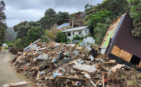 Slips, house damage in Karekare in West Auckland caused by Cyclone Gabrielle