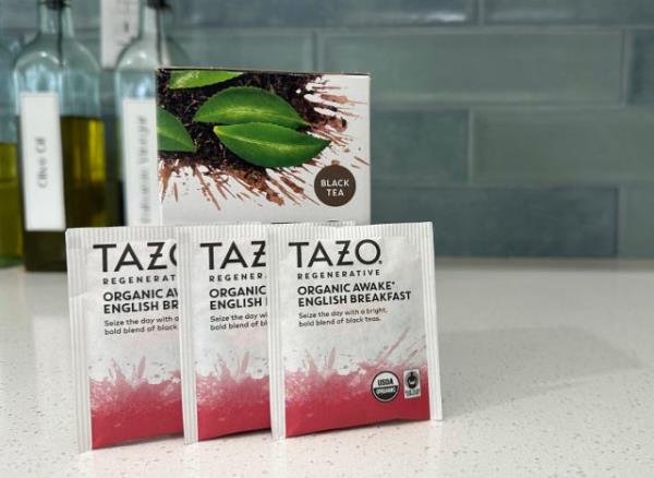 three Tazo black tea bags on countertop