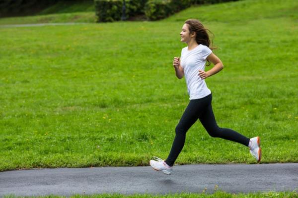 A teenage girl running.