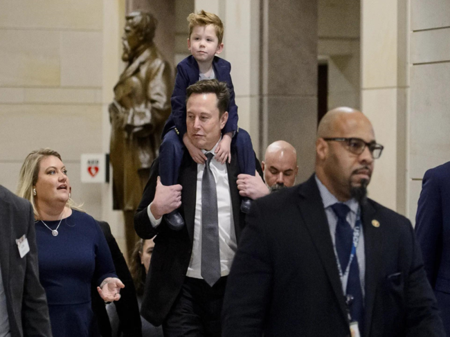 Elon Musk with his son X Æ A-Xii at Capitol Hill