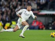 Real Madrid's Kylian Mbappe runs to the ball during the Spanish La Liga soccer match between Real Madrid and Sevilla at the Santiago Bernabeu Stadium in Madrid, Spain, Sunday, Dec. 22, 2024. (AP Photo/Bernat Armangue)


