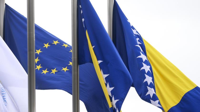 European Unio<em></em>n flag flutters next to the flag of Bosnia-Herzegovina in front of the Council of Ministers building in Sarajevo, Tuesday, March 12, 2024. (AP File Photo)