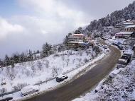 A view of the snow-covered valley after a fresh spell of snowfall, at Kufri near Shimla (PTI)