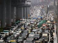 Vehicles in a traffic jam on the Western Express Highway during rain, in Mumbai. (IMAGE: PTI)