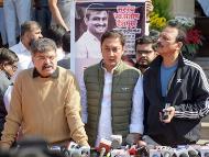 NCP-SP MLA Jitendra Awhad, left, with Co<em></em>ngress MLC Bhai Jagtap, right, addresses the media at a protest over the murder of sarpanch Santosh Deshmukh in Maharashtra's Beed district. (Image: PTI)