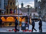 Policemen walk past the Christmas Market, wher<em></em>e a car drove into a crowd on Friday evening, in Magdeburg, Germany. (IMAGE: AP PHOTO)