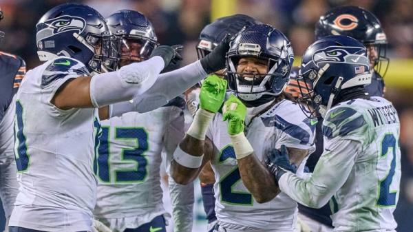 Seattle Seahawks safety Rayshawn Jenkins (No 2) celebrates after tackling Chicago Bears quarterback Caleb Williams