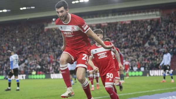 Finn Azaz celebrates his second goal of the game at the Riverside