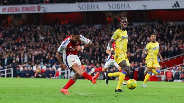 Gabriel Jesus of Arsenal scores their side's third goal