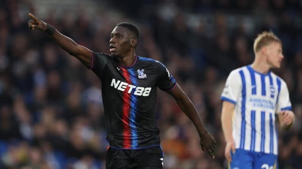 Ismaila Sarr celebrates scoring Crystal Palace's third goal