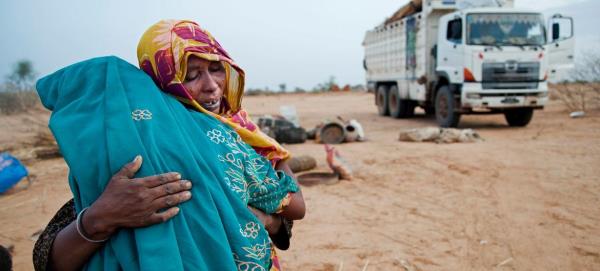 People return to their home village of Sehjanna, Sudan, after living seven years in a camp for internally displaced persons in Aramba in 2011. (file)